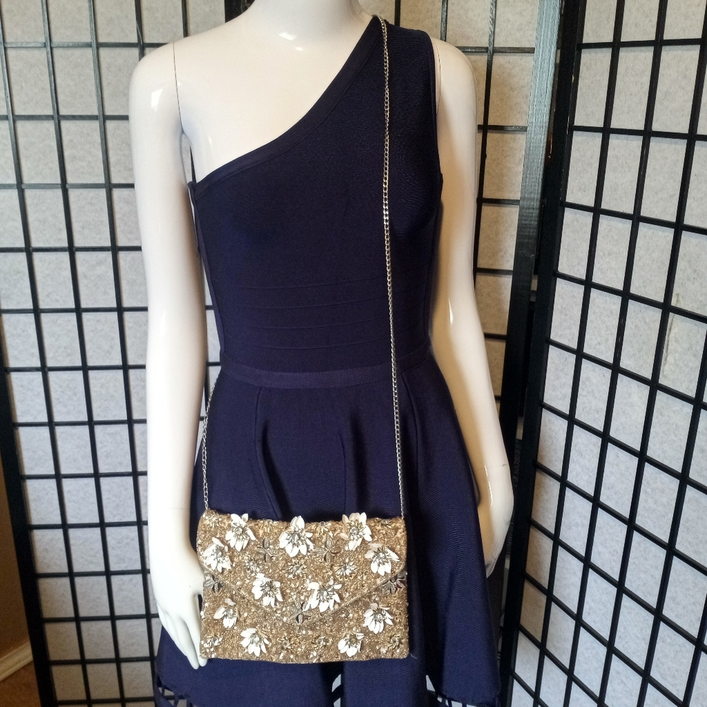 Navy One-Shoulder Dress with Gold Floral Bag.